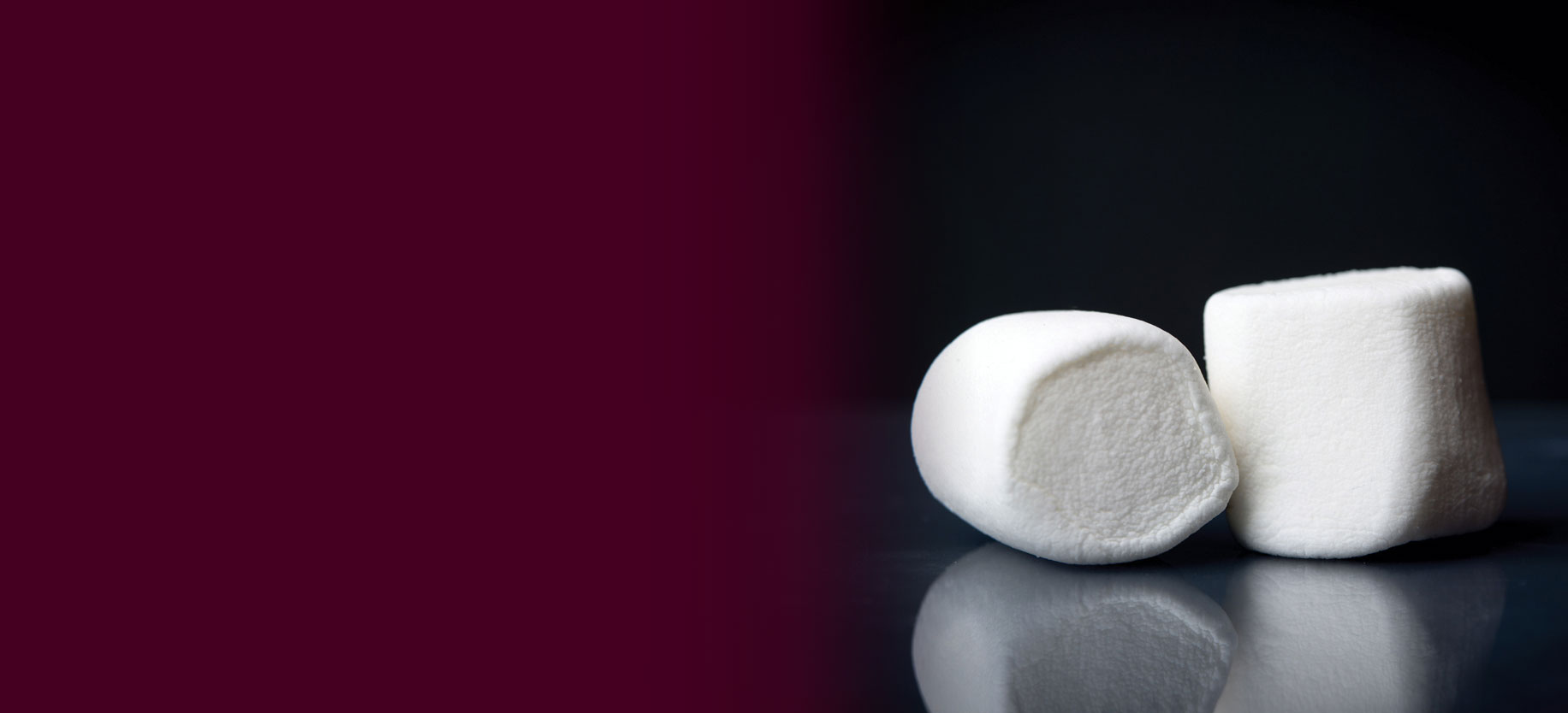A close-up of two marshmallows