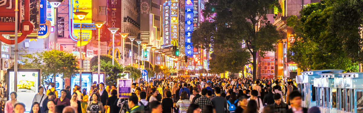 A crowd of people walking in Nanjing Road in Shanghai