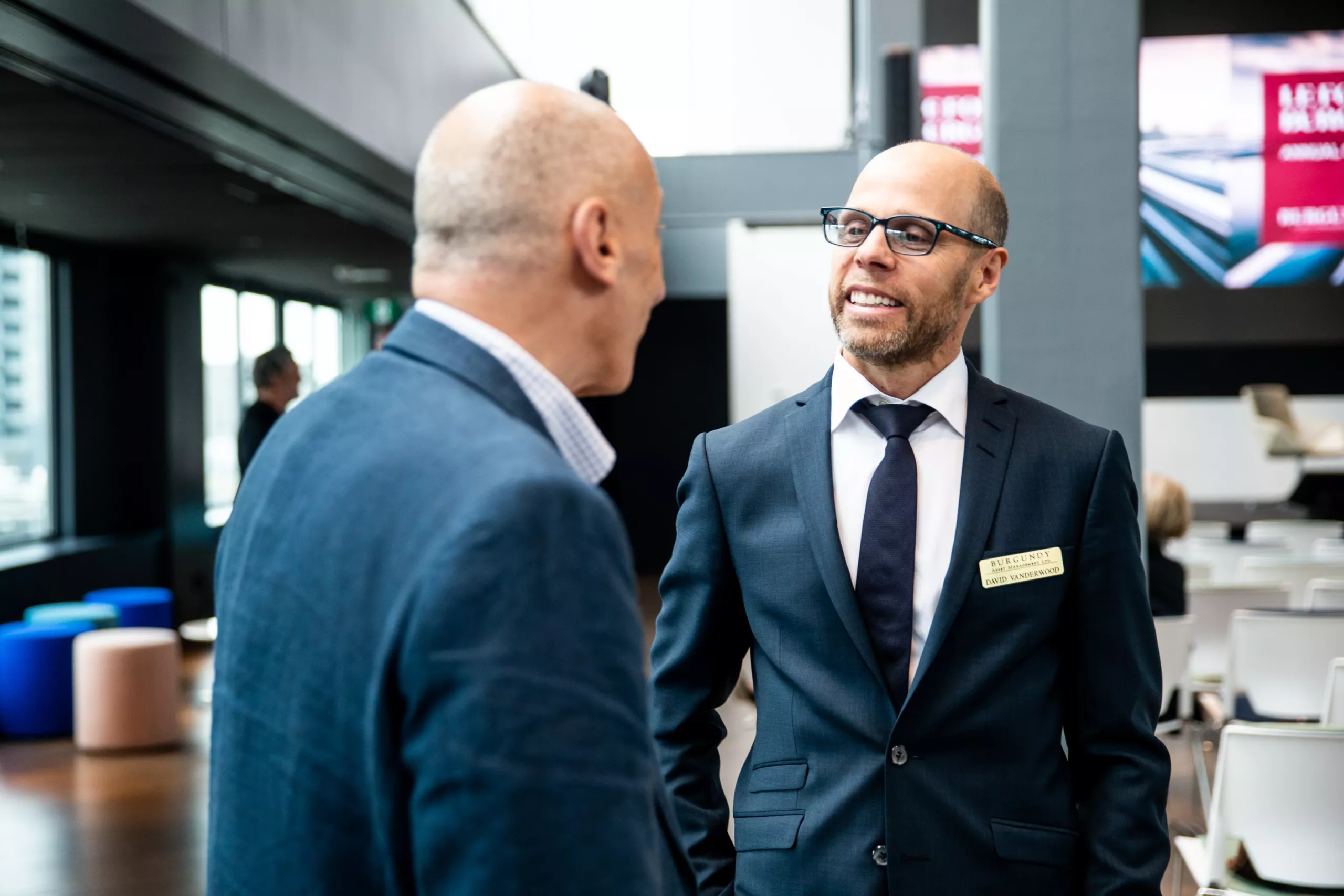 David Vanderwood speaking with a client at the Forum Burgundy in Montreal