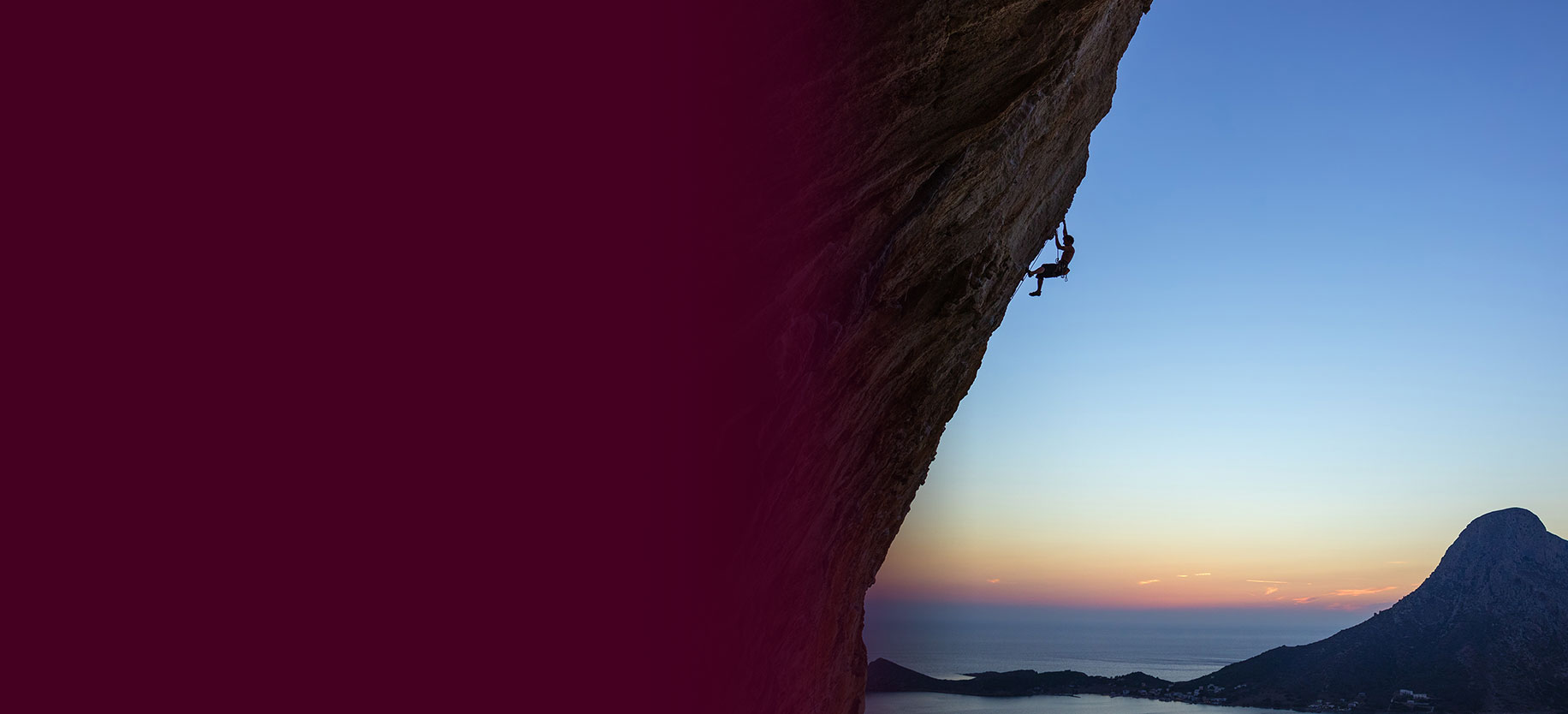 A person climbing a cliff