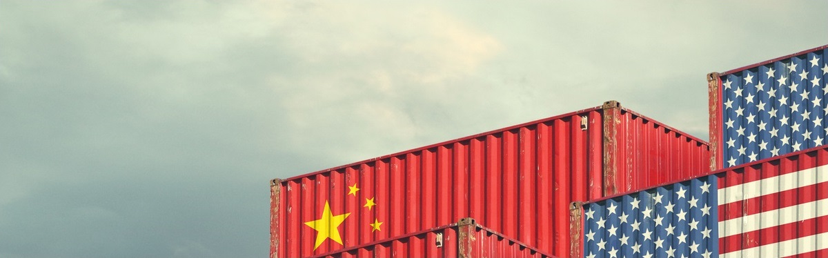 Cargo containers painted with U.S. and China flags