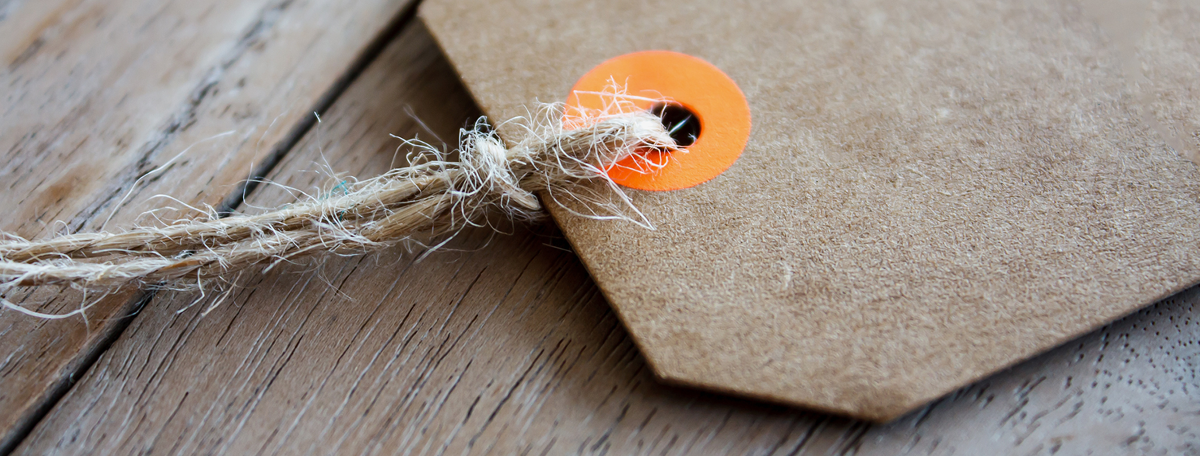 A paper tag attached to a piece of twine