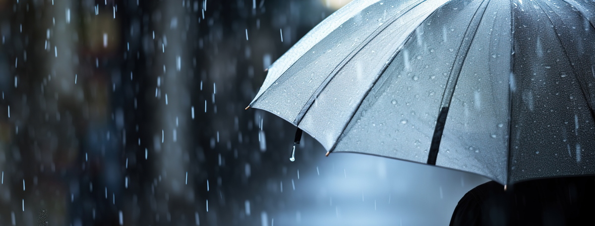 Rain falling on an umbrella