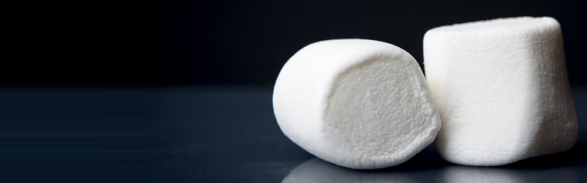 A close-up of two marshmallows
